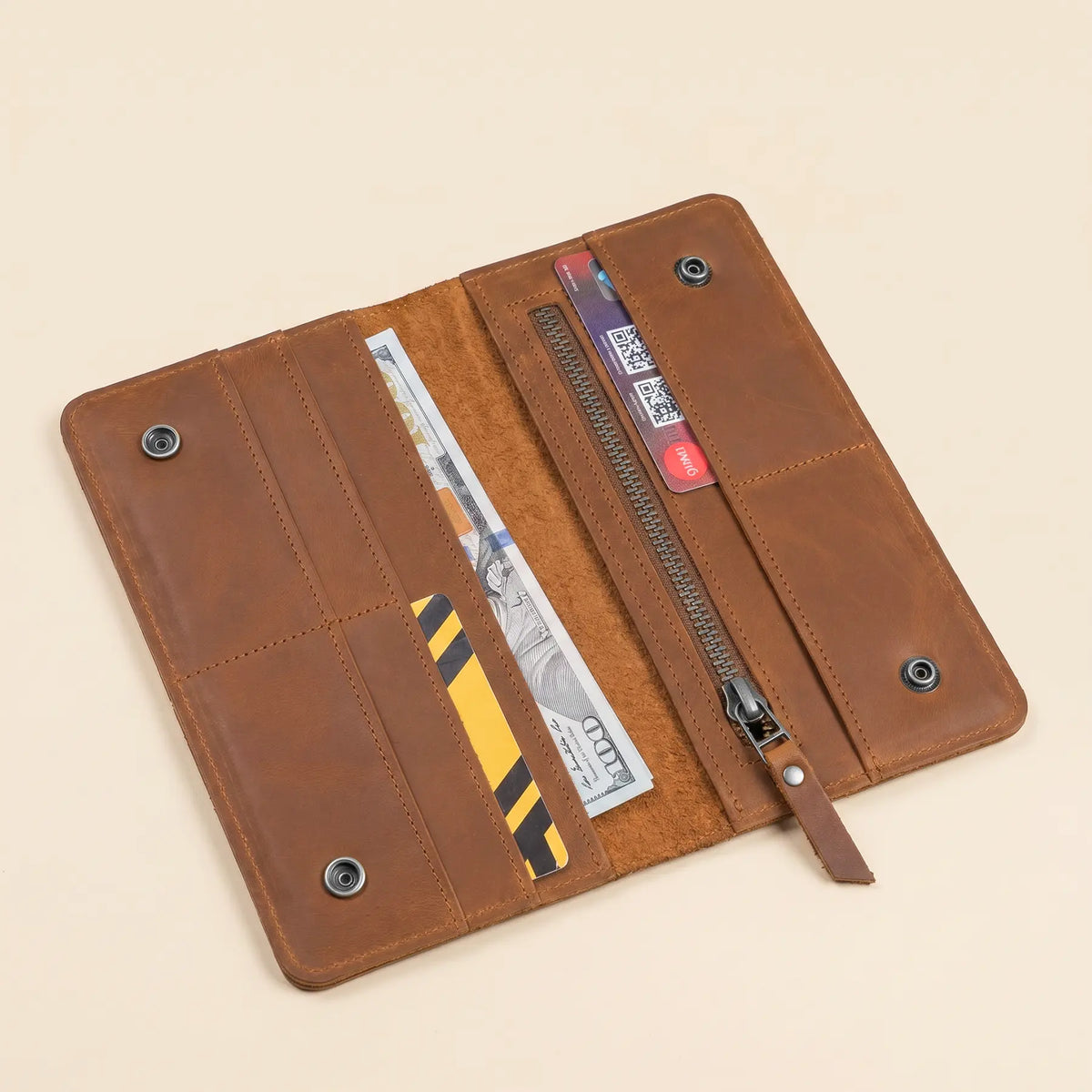 Caramel leather long wallet with card slots and a zip pocket