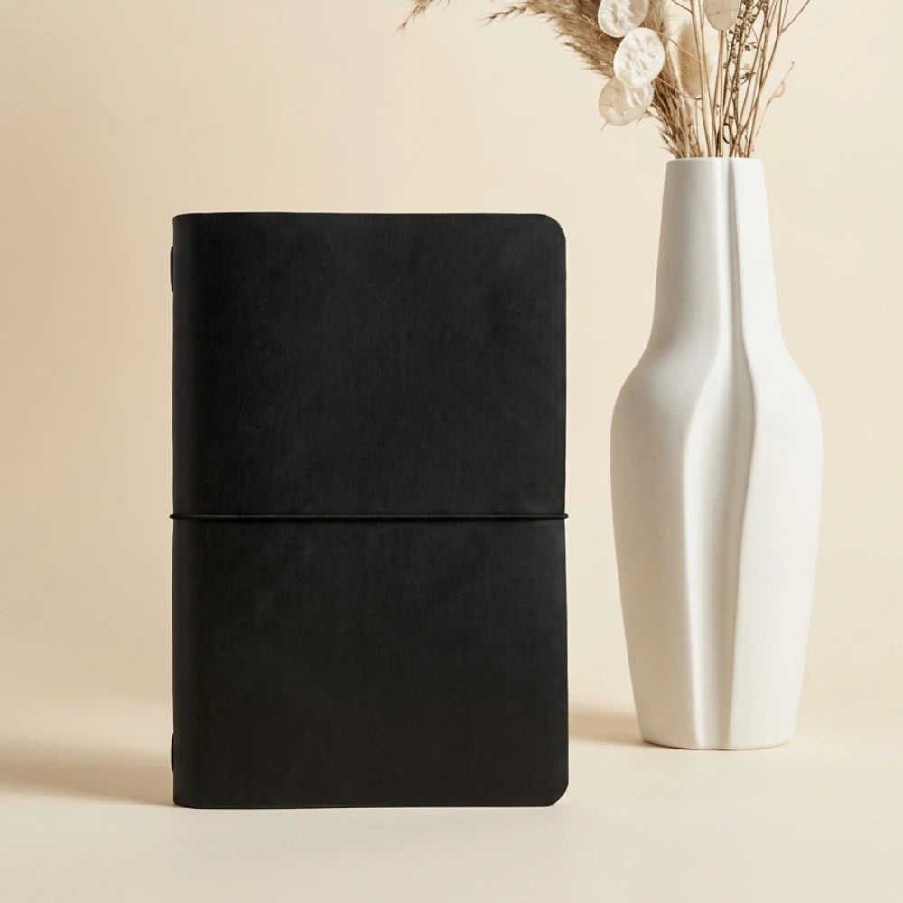 Classic genuine leather notebook sleeve with handcrafted details for everyday use.