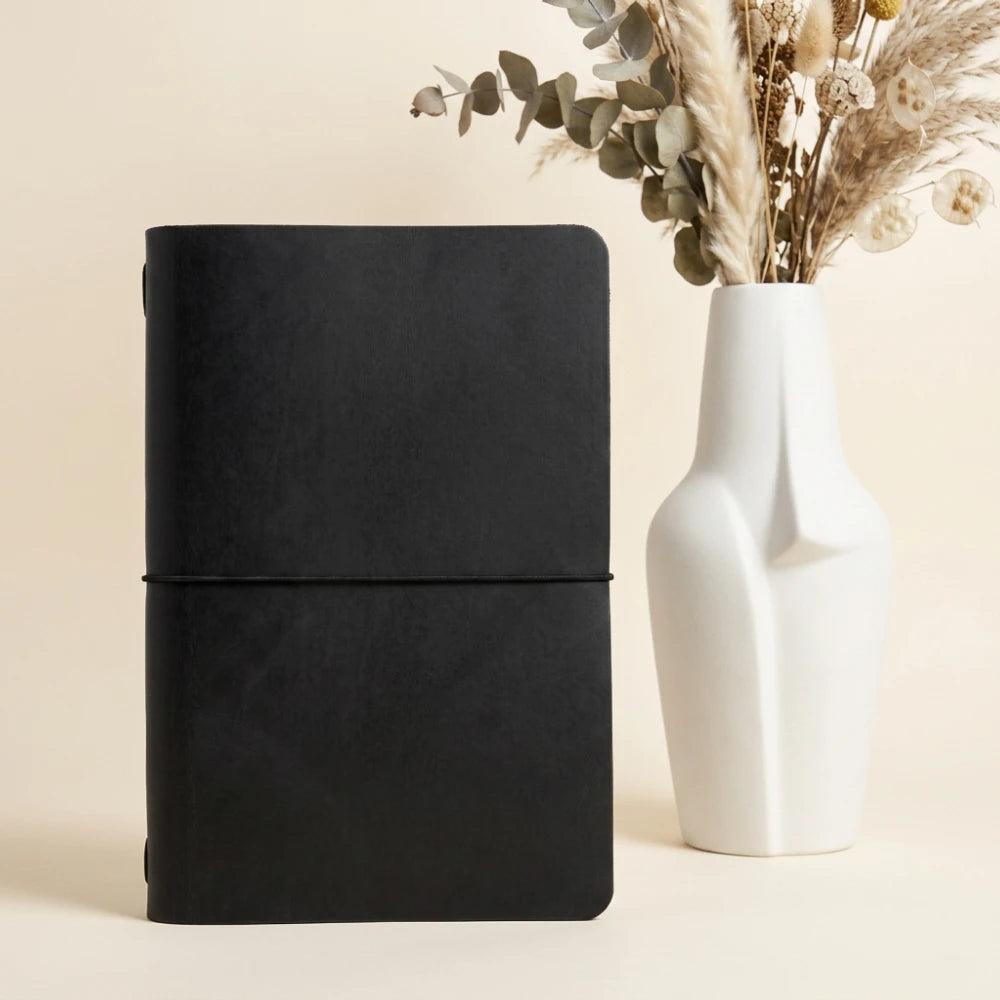 Refined leather writing cover with minimalist construction for a basic everyday notebook.