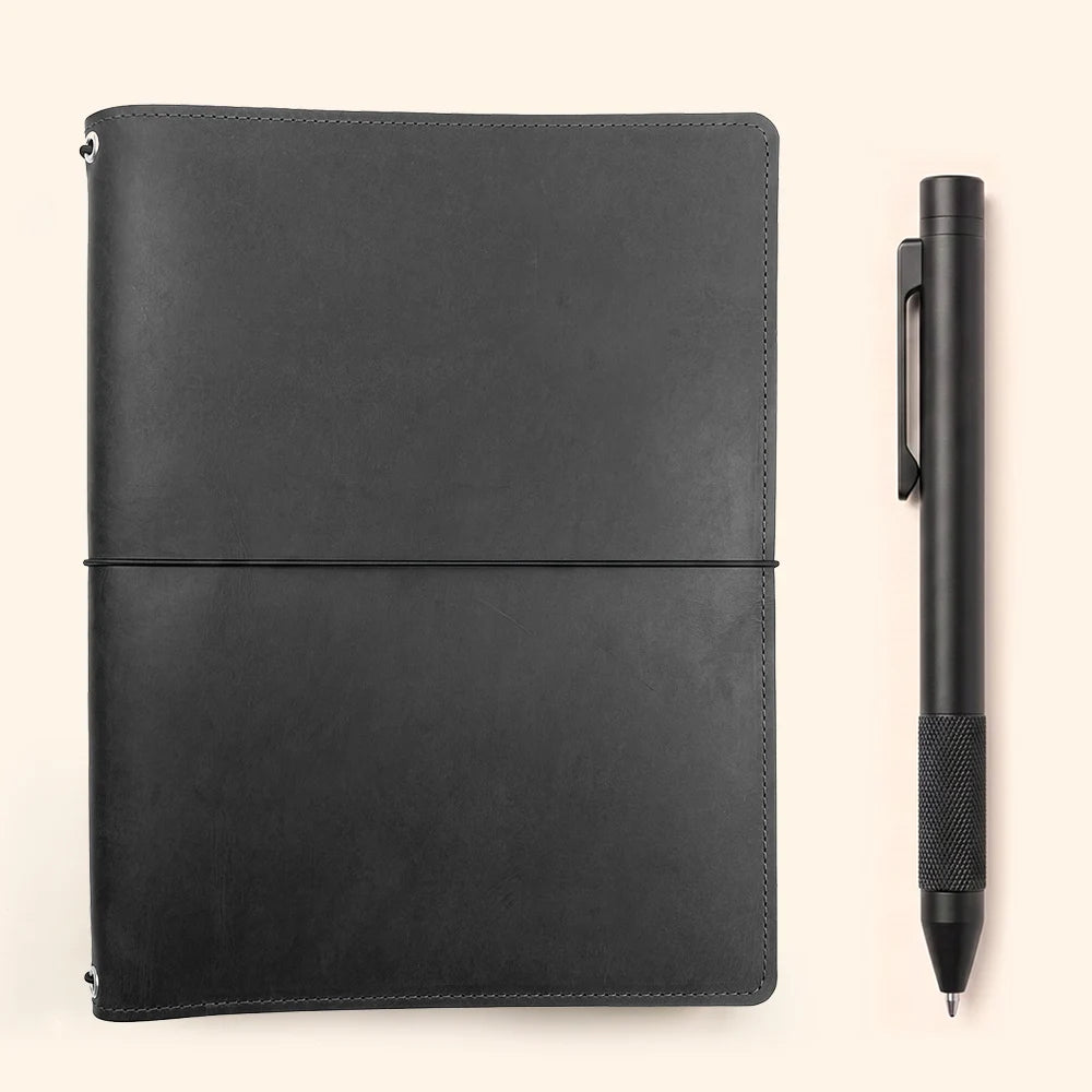 Genuine leather refillable cover with a versatile interior for journals and sketchbooks.