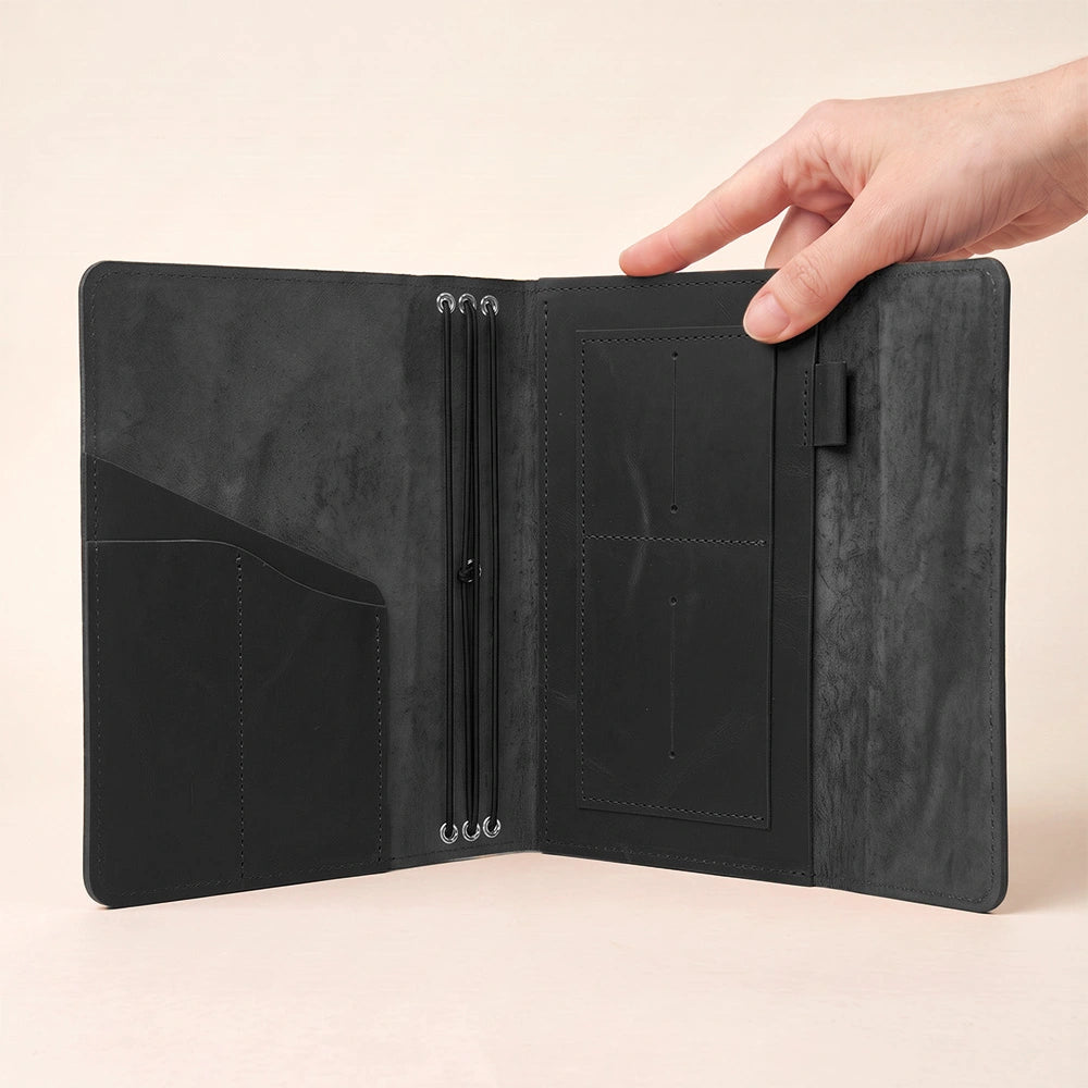 Refillable genuine leather notebook cover featuring interior pockets and practical pen holder.