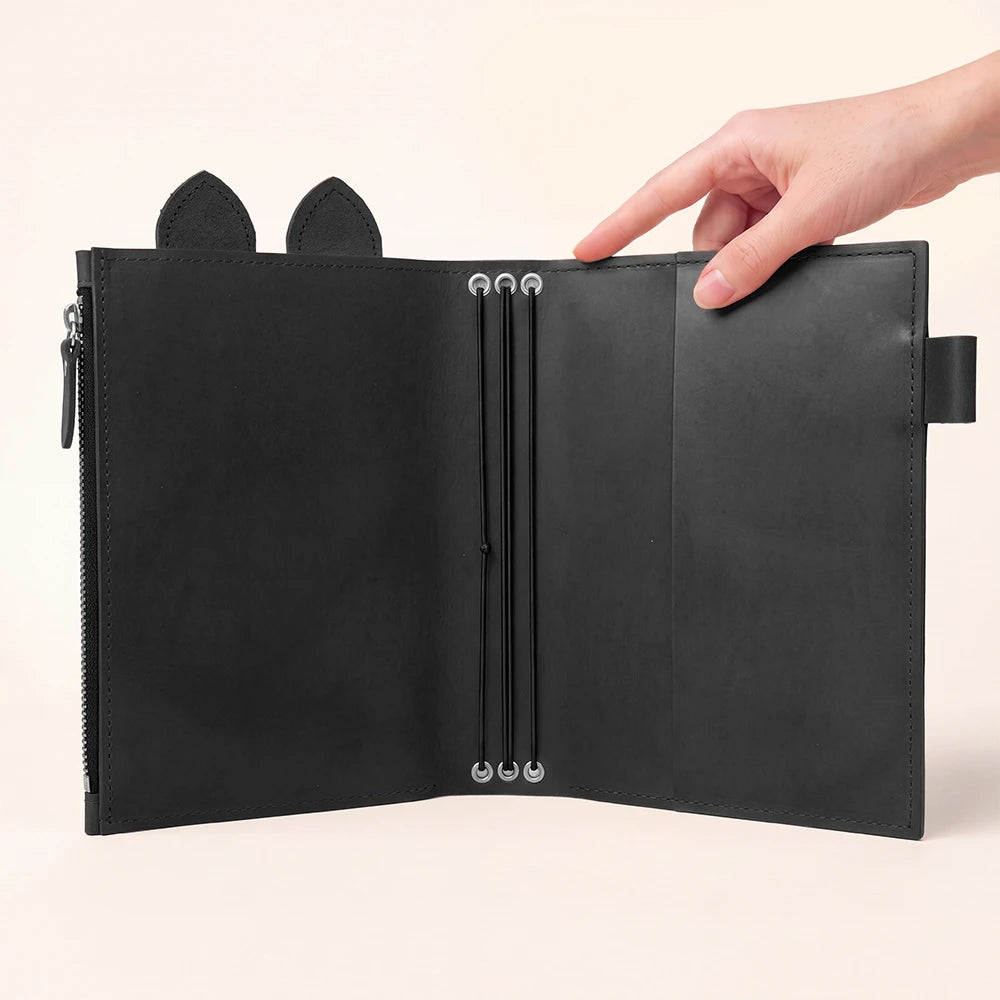 Leather notebook cover designed for multiple inserts and everyday organization.