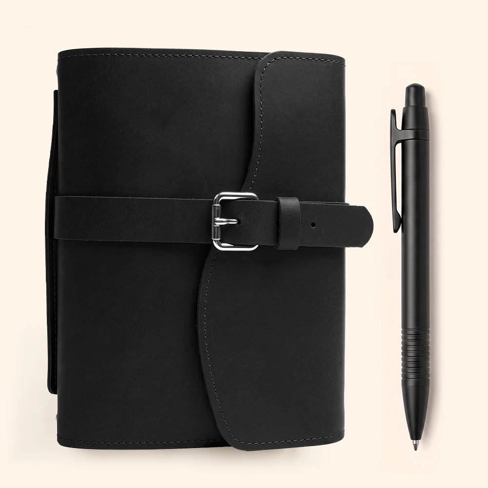 Natural leather journal carrier featuring practical compartments, pen keeper, integrated bookmark, and sturdy outside handle.