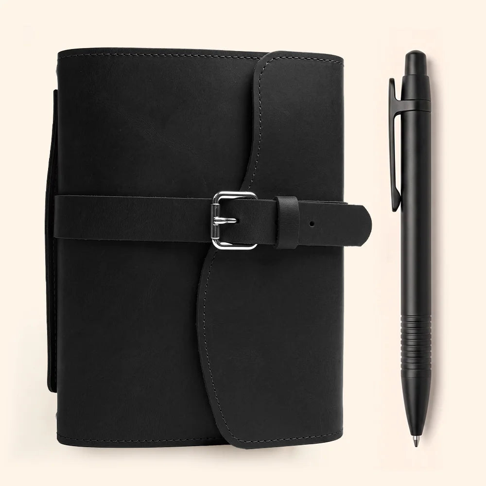 Leather notebook organizer featuring spacious pockets, secure pen holder, integrated bookmark, and convenient external handle.