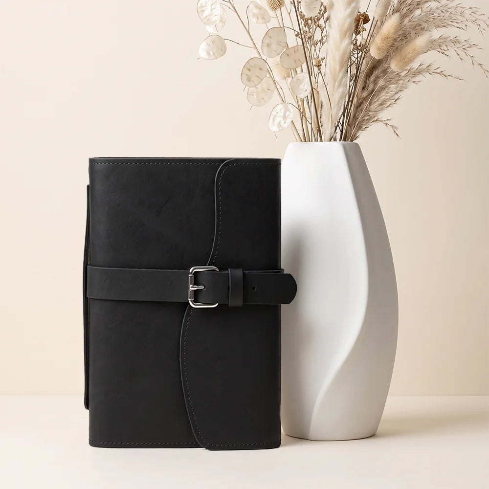 Genuine leather journal organizer with inner pockets, pen loop, ribbon page marker, and functional handle.