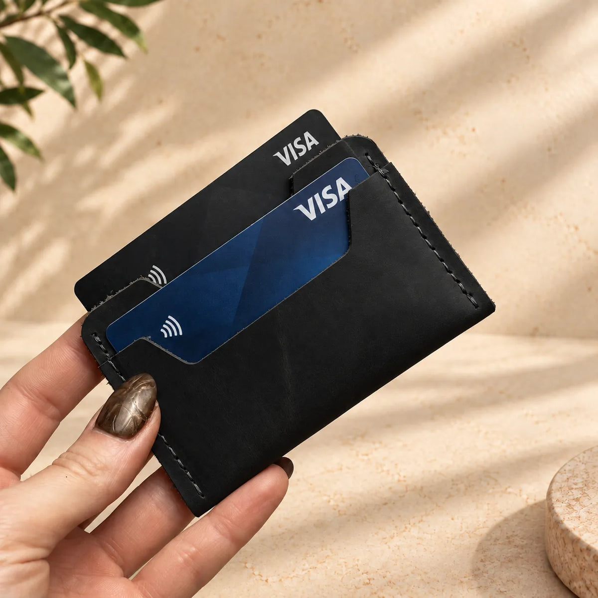 Handmade leather card holder designed for carrying essential cards