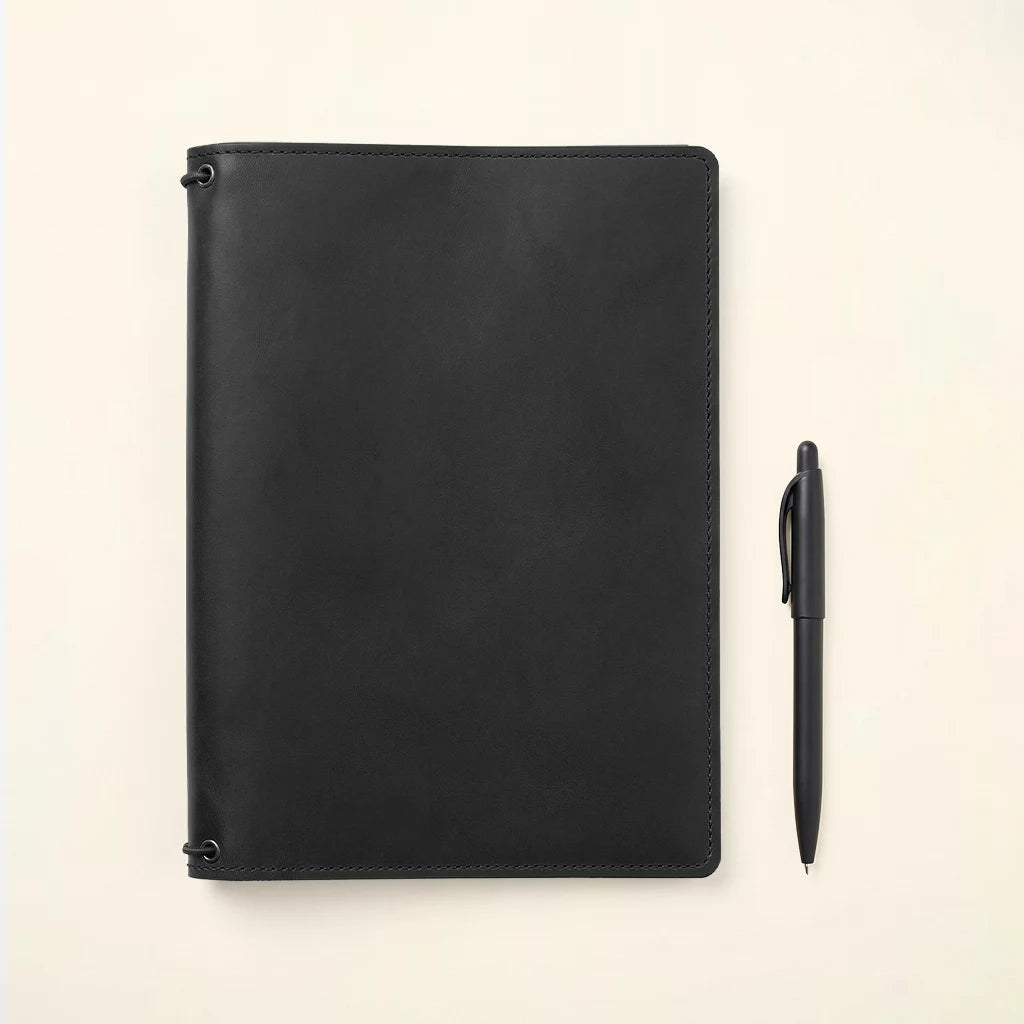 Leather refillable notebook system designed for long-term use and organization.