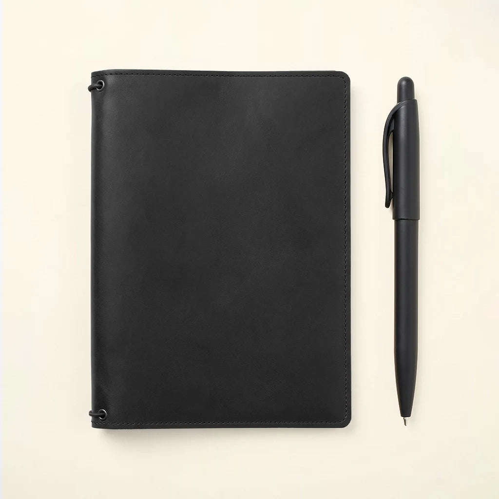 Rustic handmade notebook cover with three elastics and storage pockets.