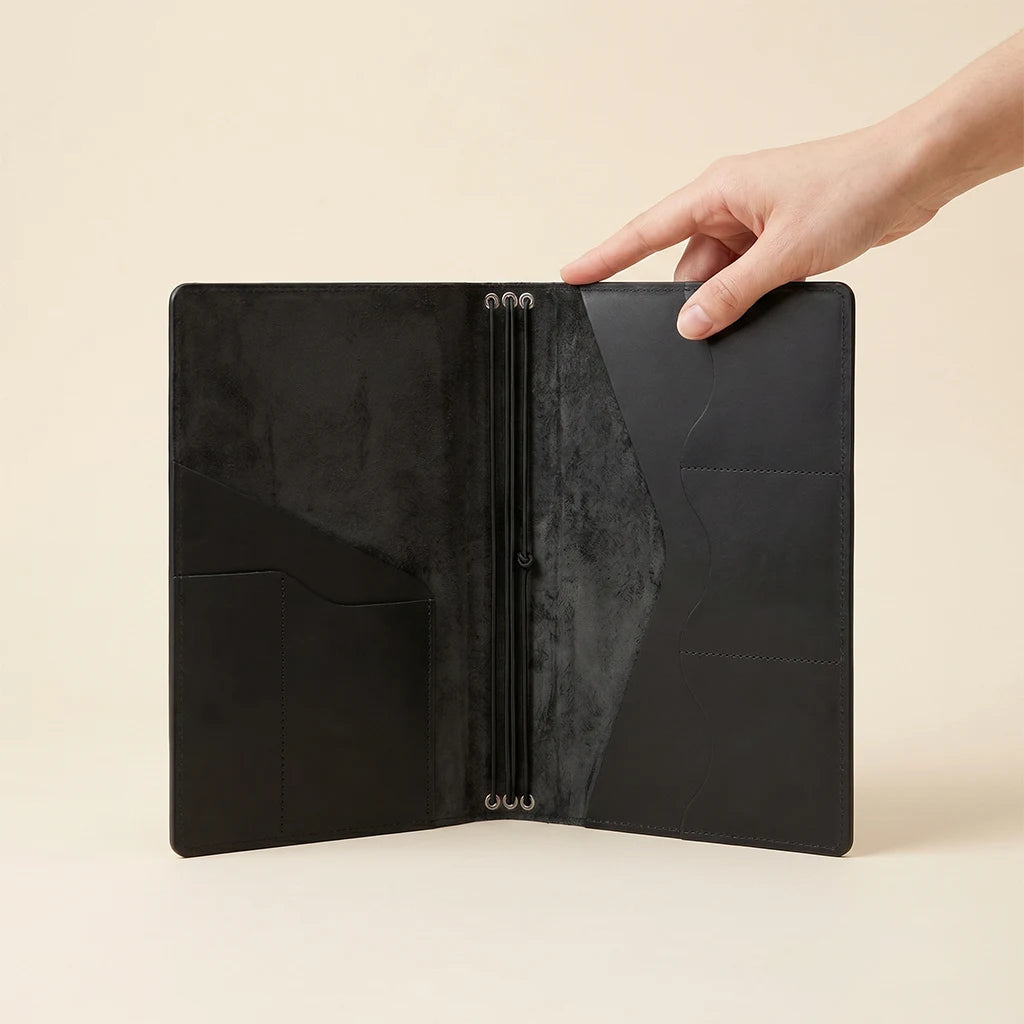 Elegant journal cover with handcrafted details and interior storage features.