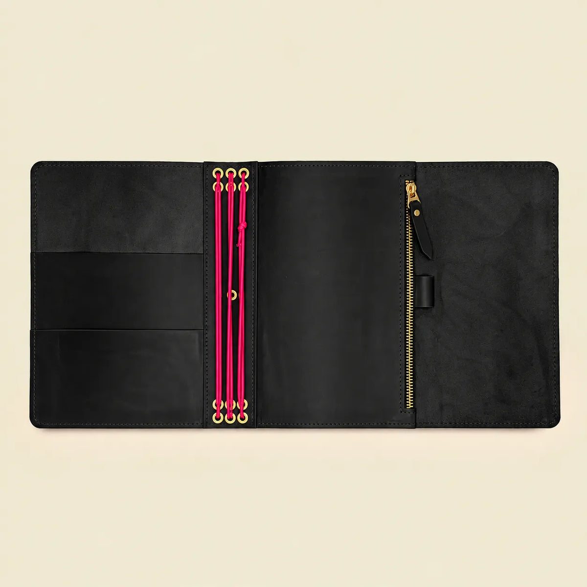 Black genuine leather notebook cover with vibrant pink elastic bands