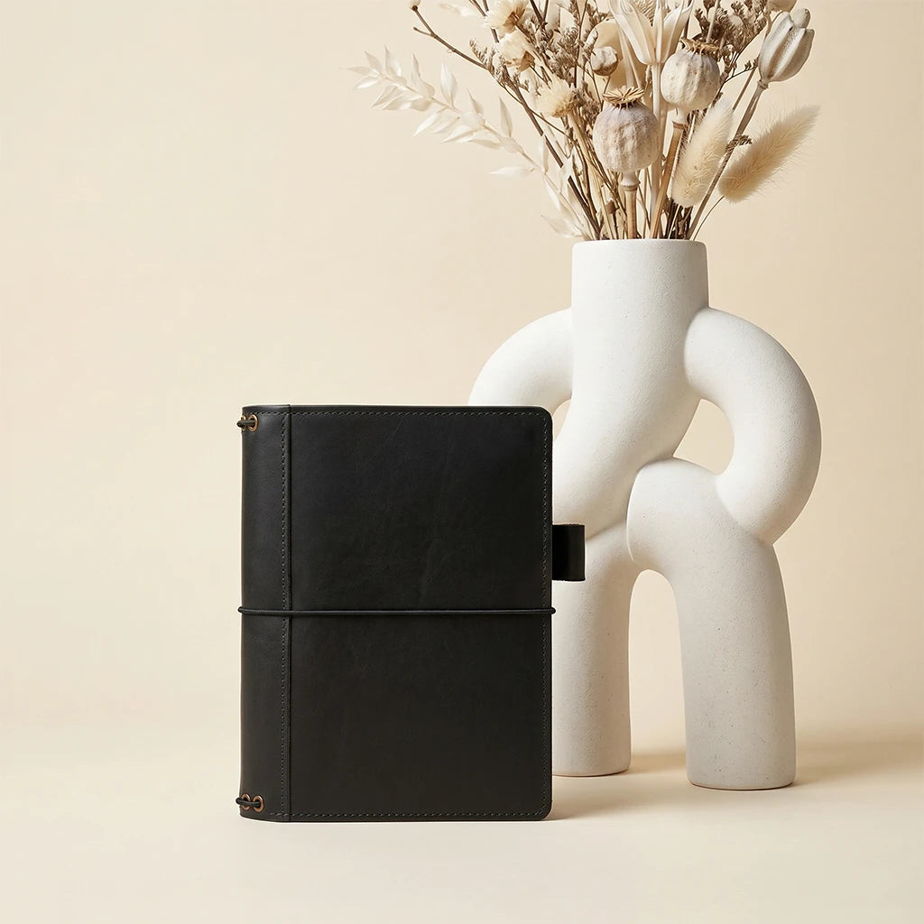 Premium leather notebook cover with five elastic bands and inner storage