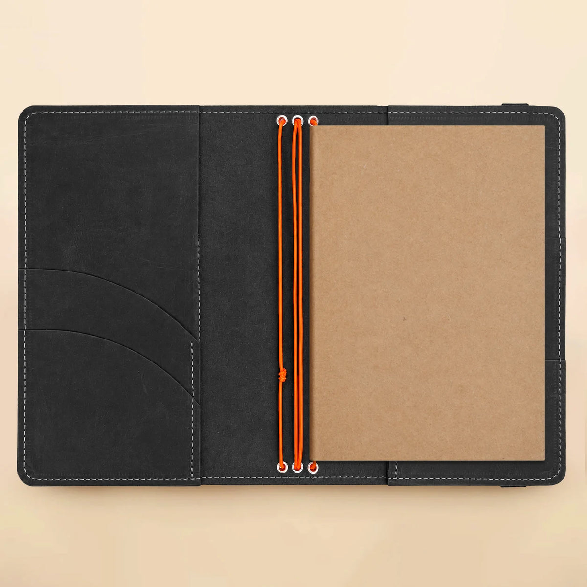 Genuine leather journal cover with three elastic loops, spacious compartments, and an outer transparent photograph panel.