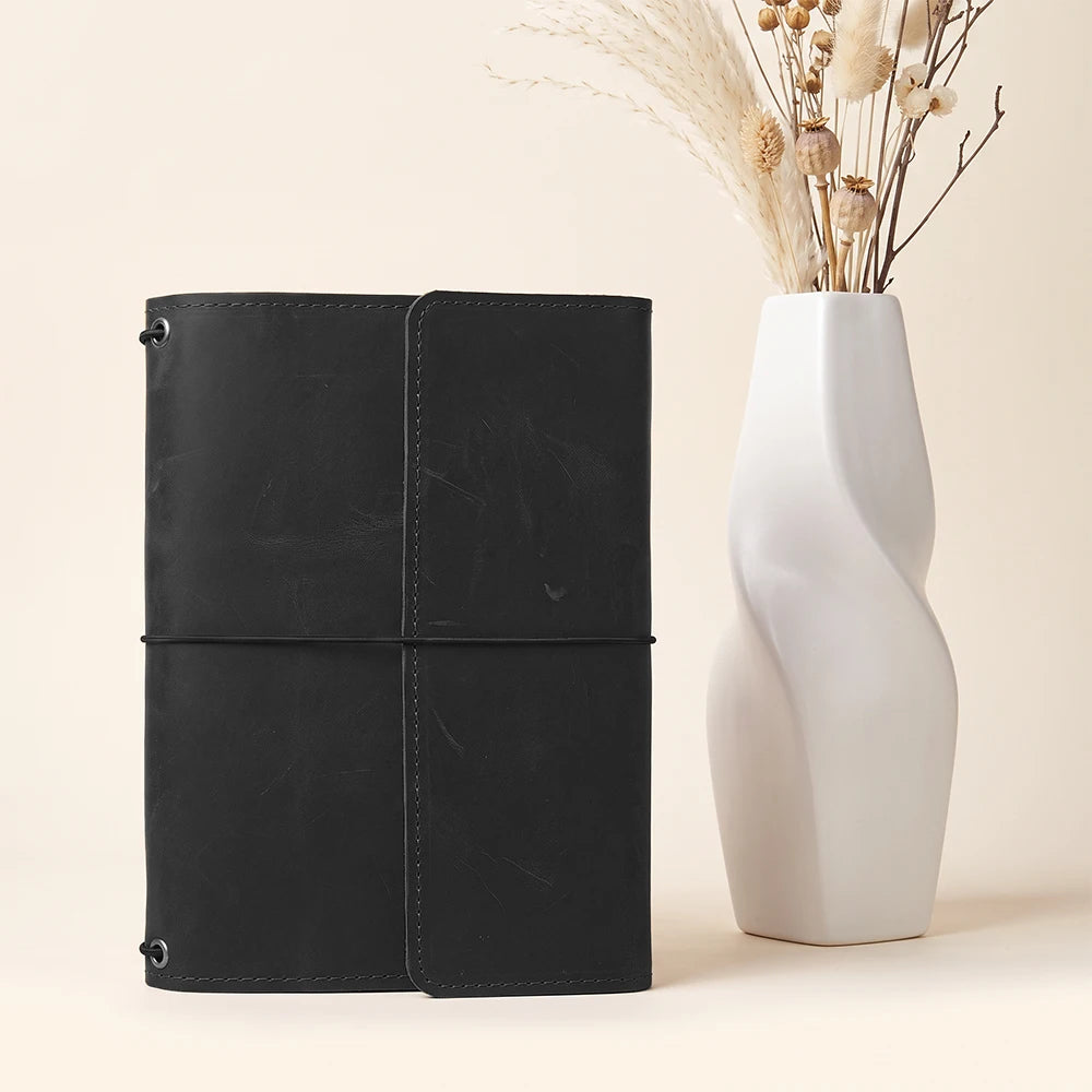 Genuine leather notebook wrap designed for efficient organization and comfortable everyday journaling.