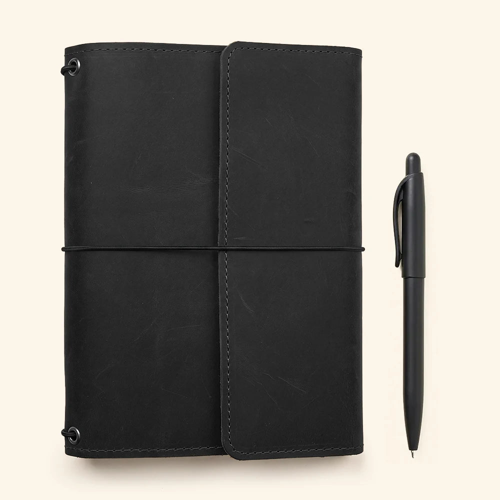 Handmade leather notebook organizer offering secure journal retention and premium stitched craftsmanship.