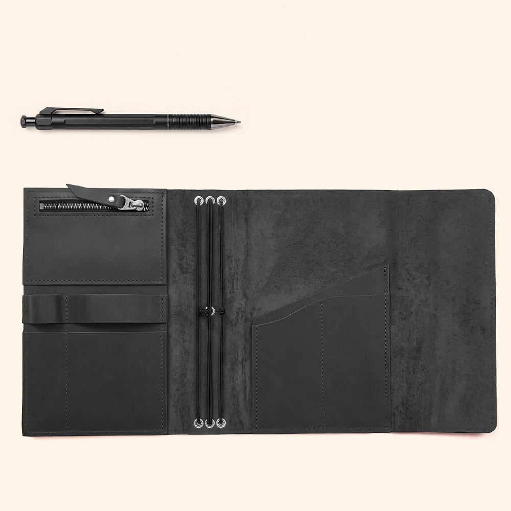 Genuine leather notebook case showing interior organizers for cards, notes, and writing tools.