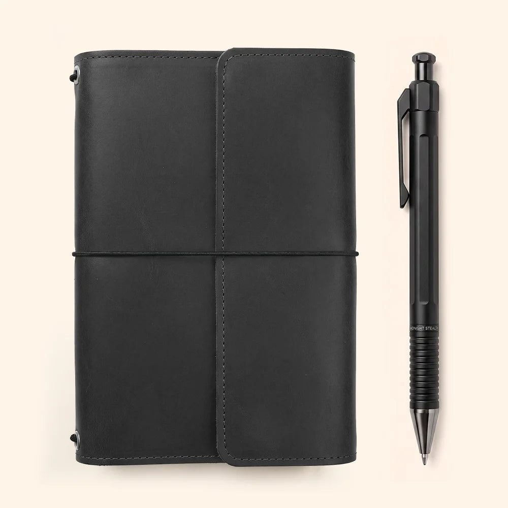 Natural leather journal cover featuring spacious pockets and a practical integrated pen loop
