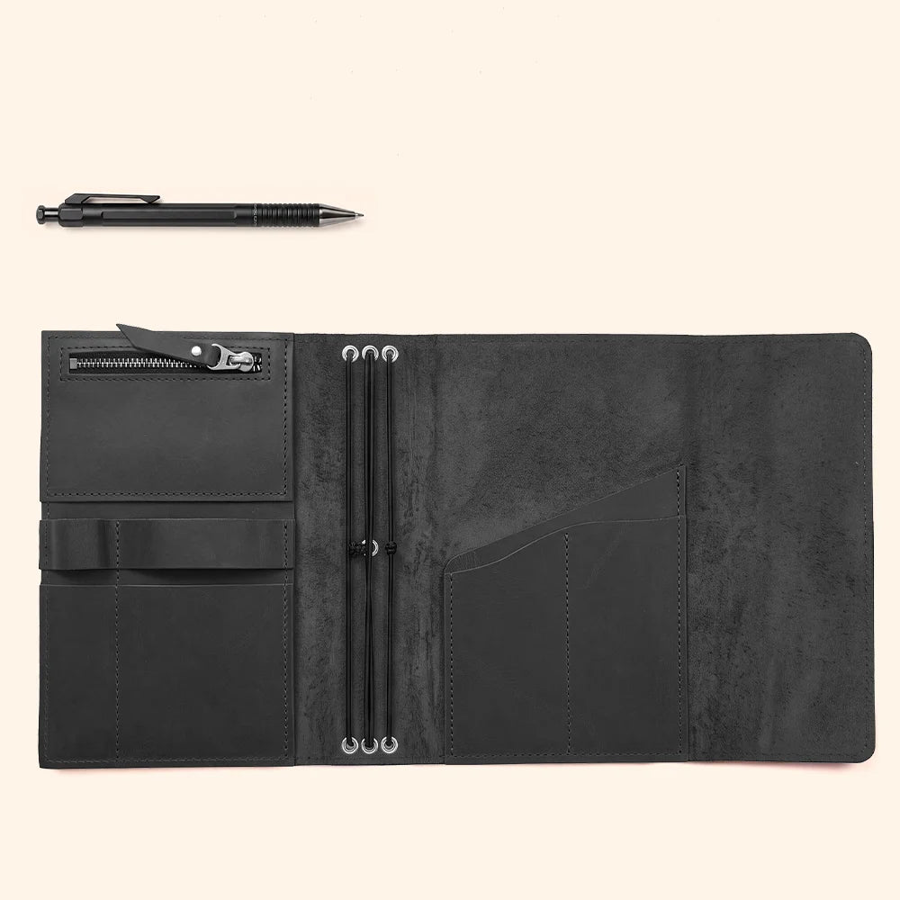 Authentic leather notebook cover with carefully constructed compartments for daily essentials and pens.