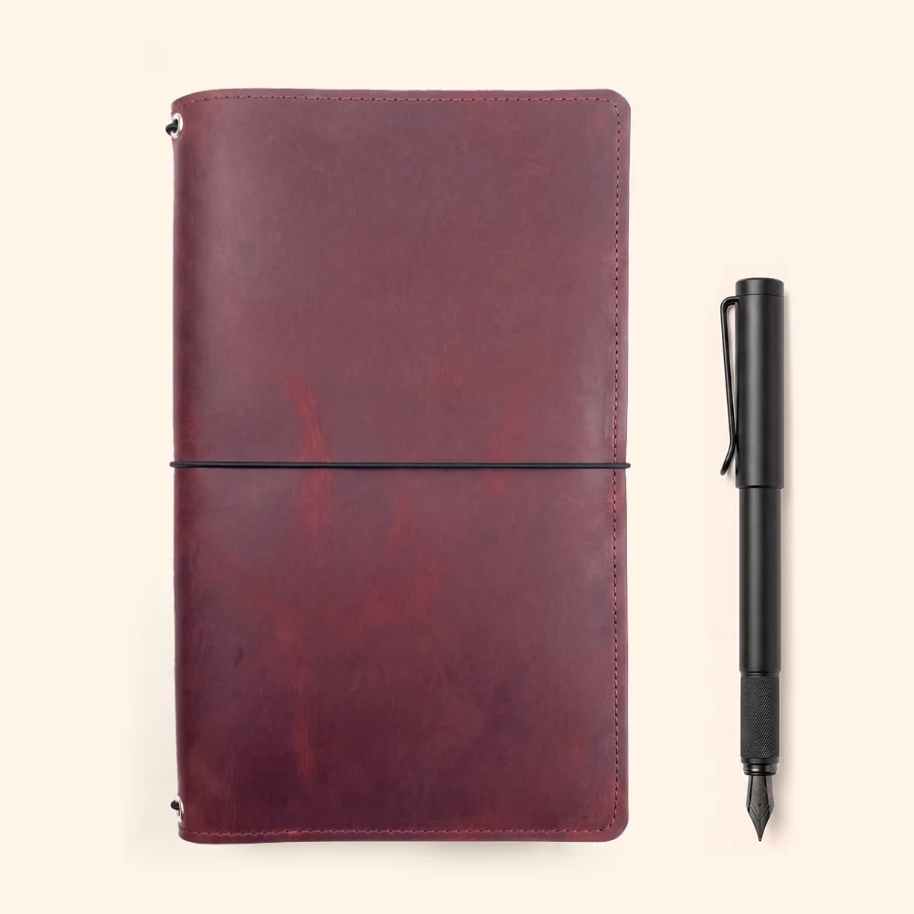 Practical leather cover creating one organized home for three individual notebooks.