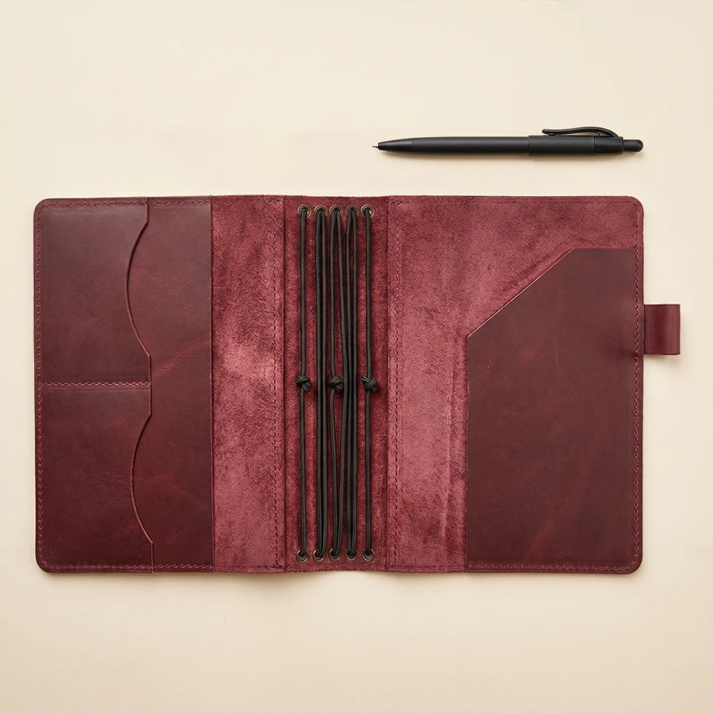 Leather cover with five elastic notebook loops and interior organizer space