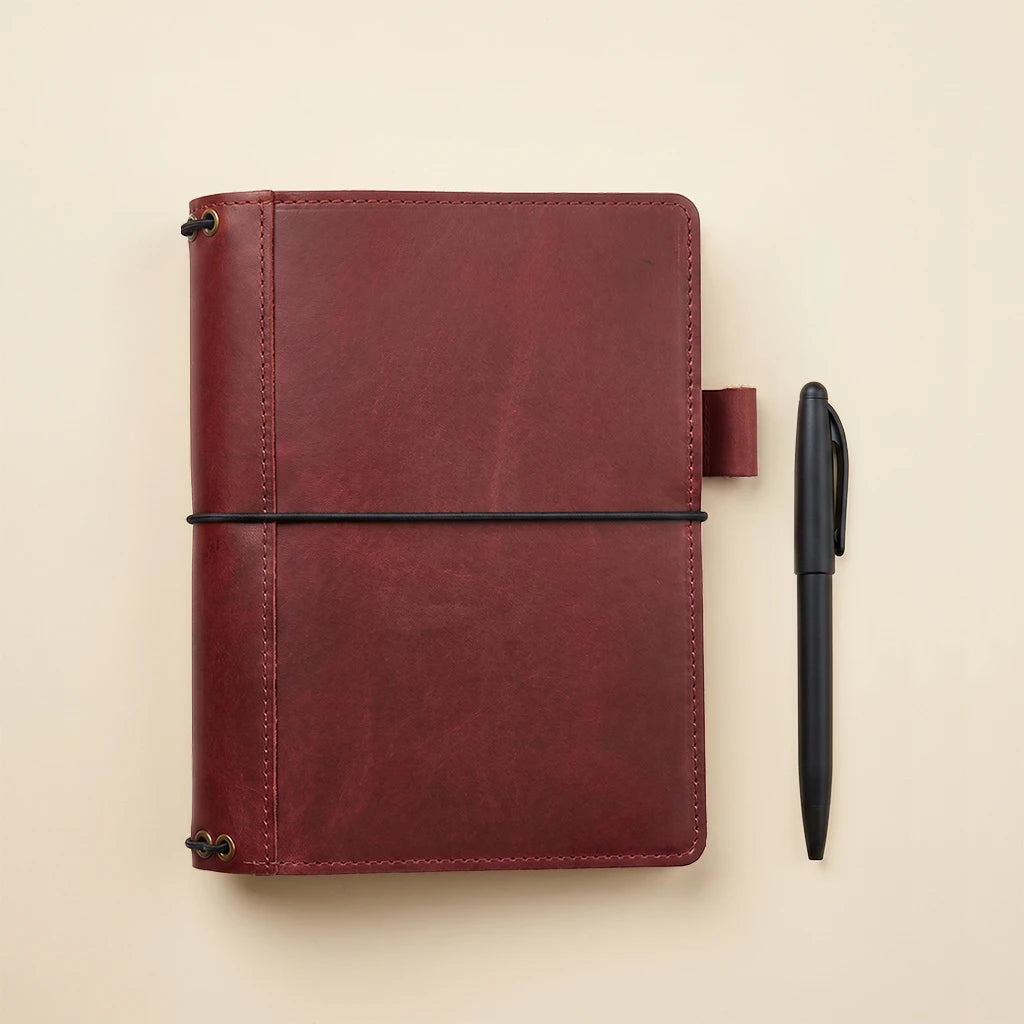 Functional leather journal cover with refillable bands and organized interior