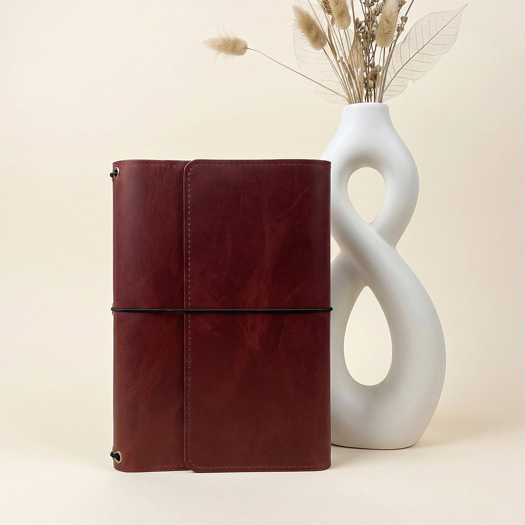 Handmade leather notebook organizer with durable construction for daily office and travel use.