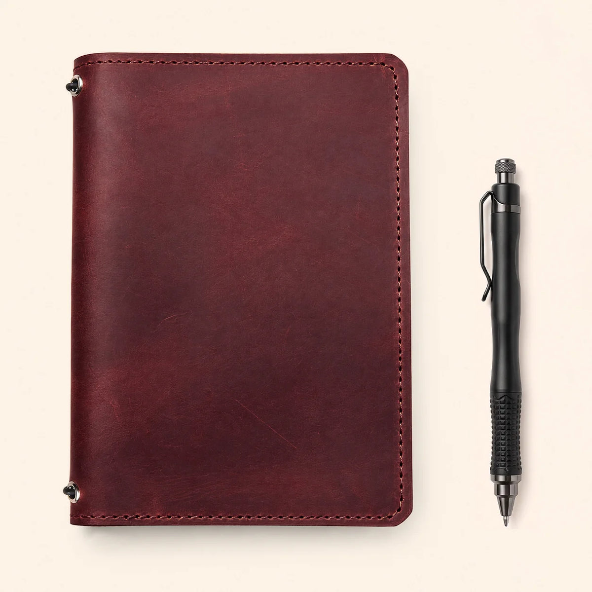 Premium leather notebook sleeve with authentic Crazy Horse finish and dual elastic fasteners