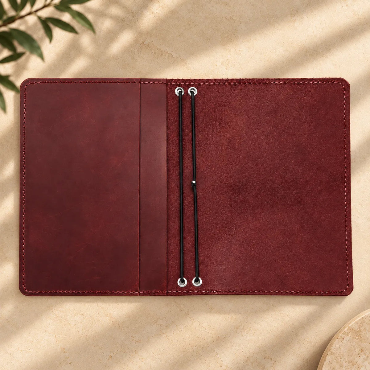 Leather journal cover with practical inside pockets and two durable elastic bands.