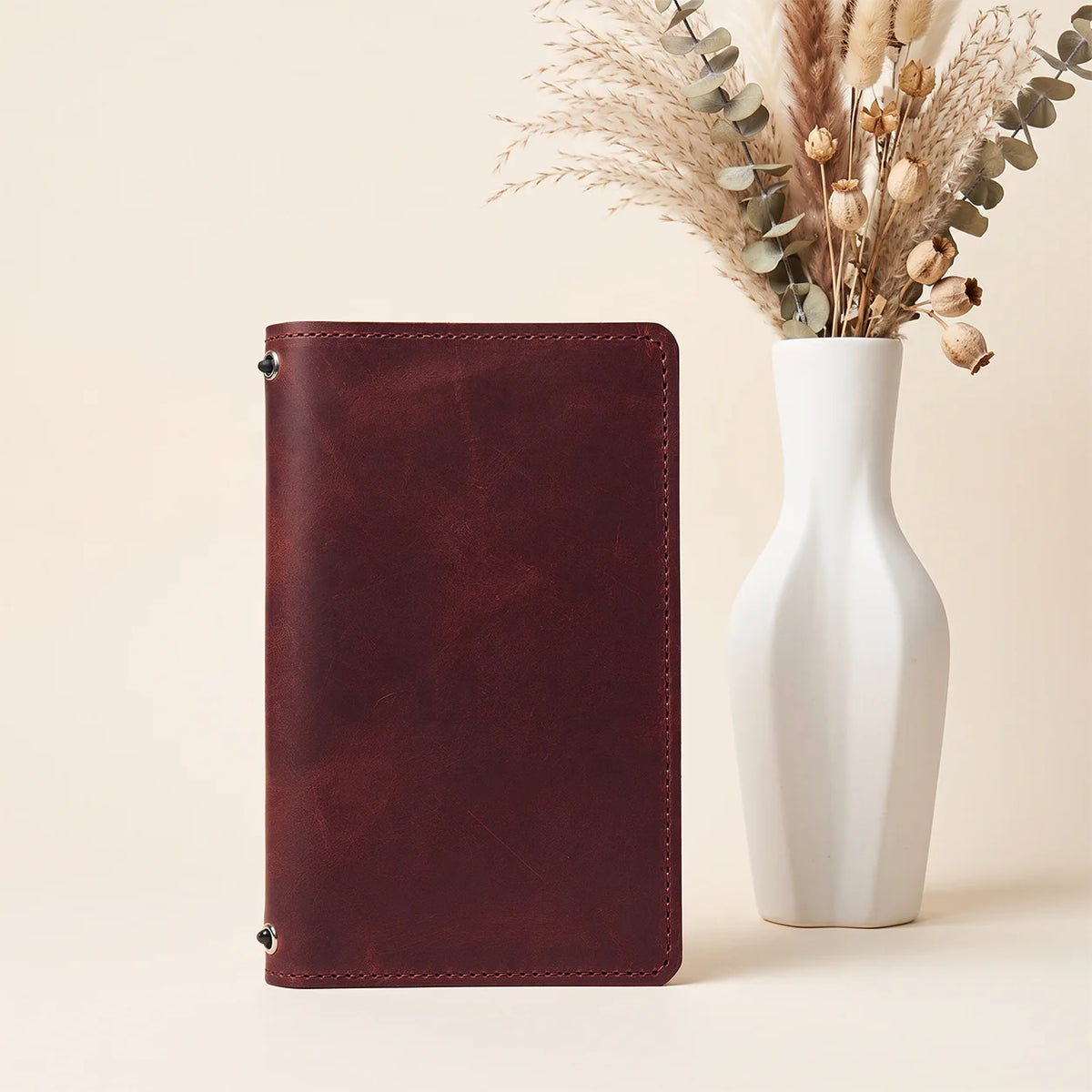 First grade natural leather journal sleeve with two straps and interior compartments