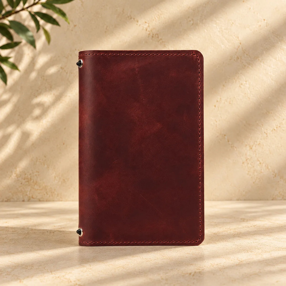 Natural leather notebook cover with two elastic closures and useful pockets for inserts.