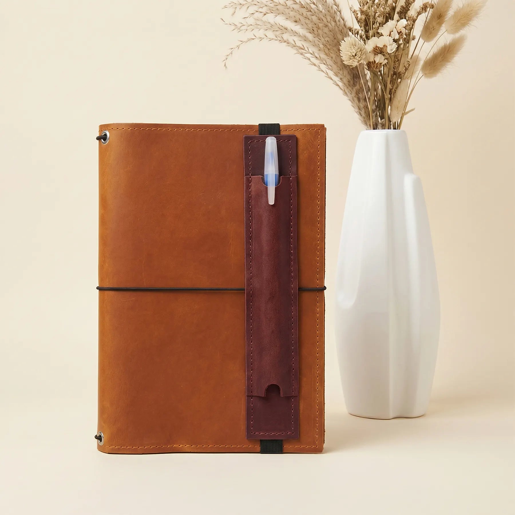 Handmade leather pen sleeve with elastic band fitting most notebooks and journals
