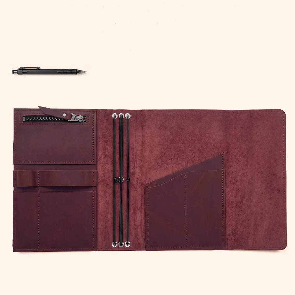 Premium leather journal organizer with functional interior storage and a convenient holder for pens.
