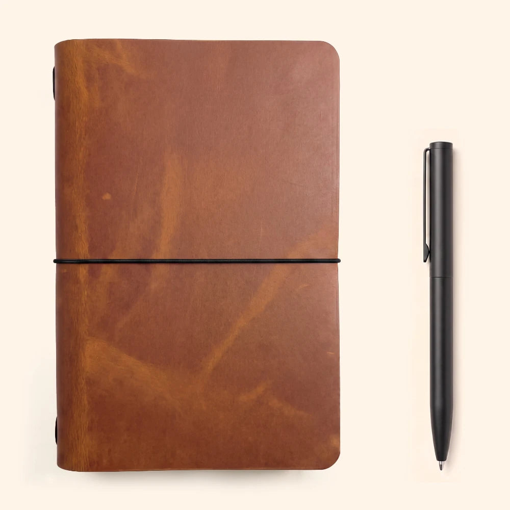 Handmade leather notebook holder designed for writers who appreciate clean simplicity.