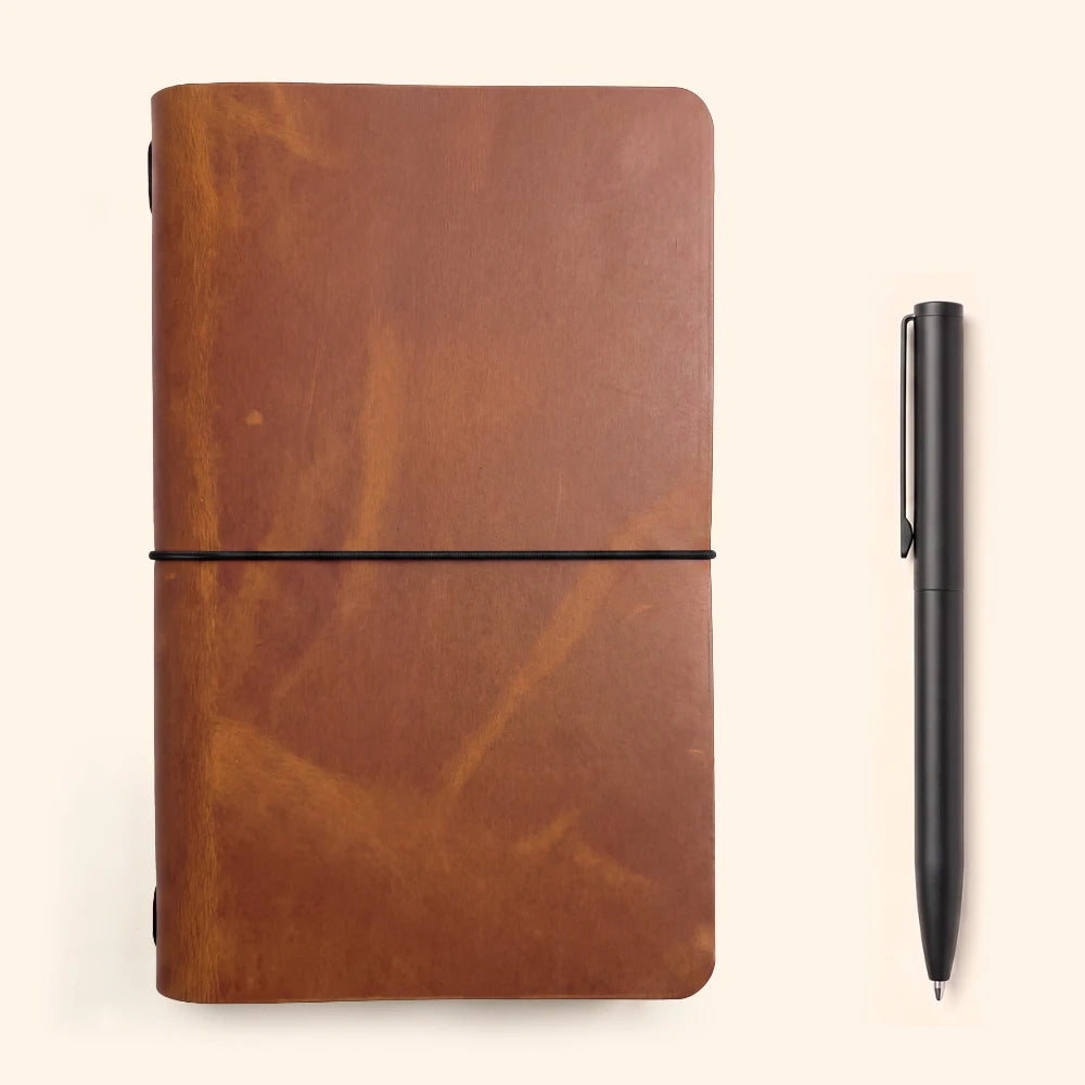 Genuine leather journal cover with understated style and a basic writing notebook.