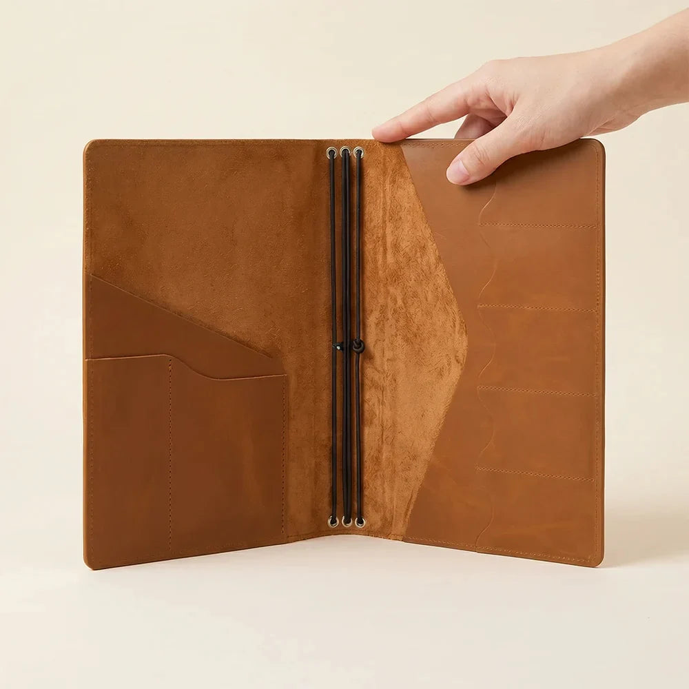 Leather notebook cover with handcrafted quality and practical organizer pocket arrangement.