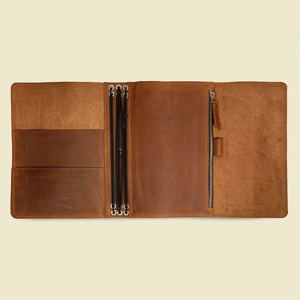 Genuine leather notebook cover with interior pockets and six elastic bands for journals.