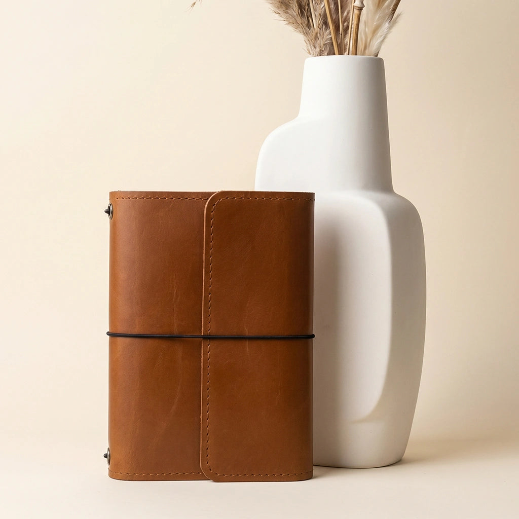Genuine leather refillable notebook organizer perfect for work, travel, and creative projects.