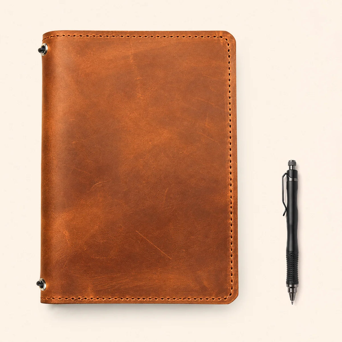 Premium Crazy Horse leather notebook sleeve featuring paired elastic straps and interior pockets