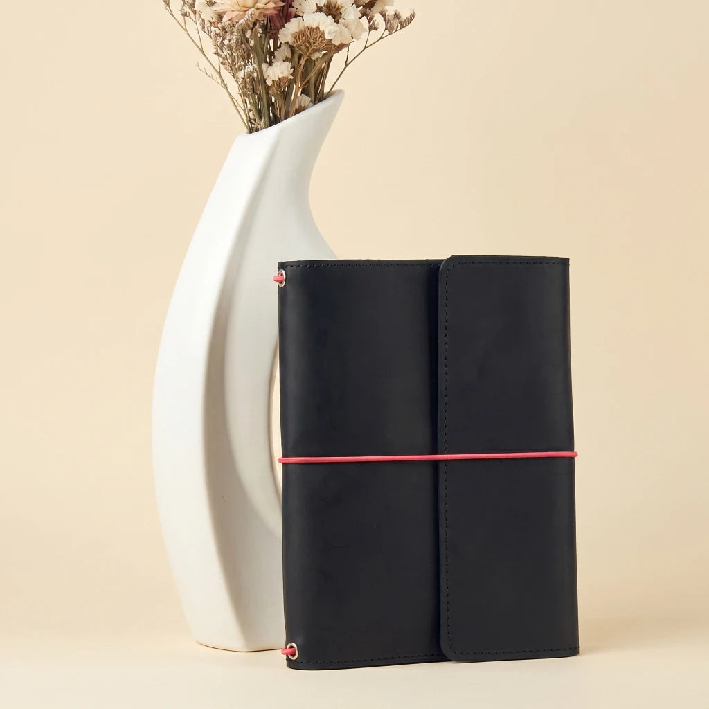 Minimal leather journal cover with elastic bands and premium handmade finish