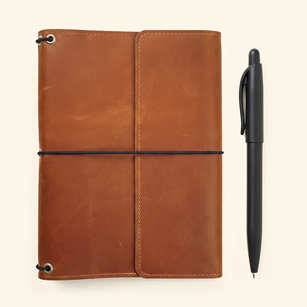 Refillable leather writing organizer crafted for professionals, students, travelers, and creative thinkers.