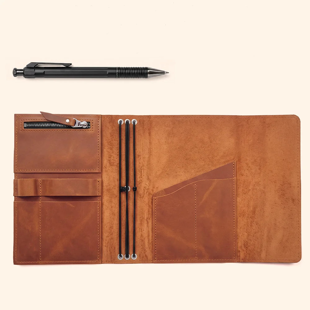 Genuine leather notebook cover designed with several pockets and dedicated pen storage