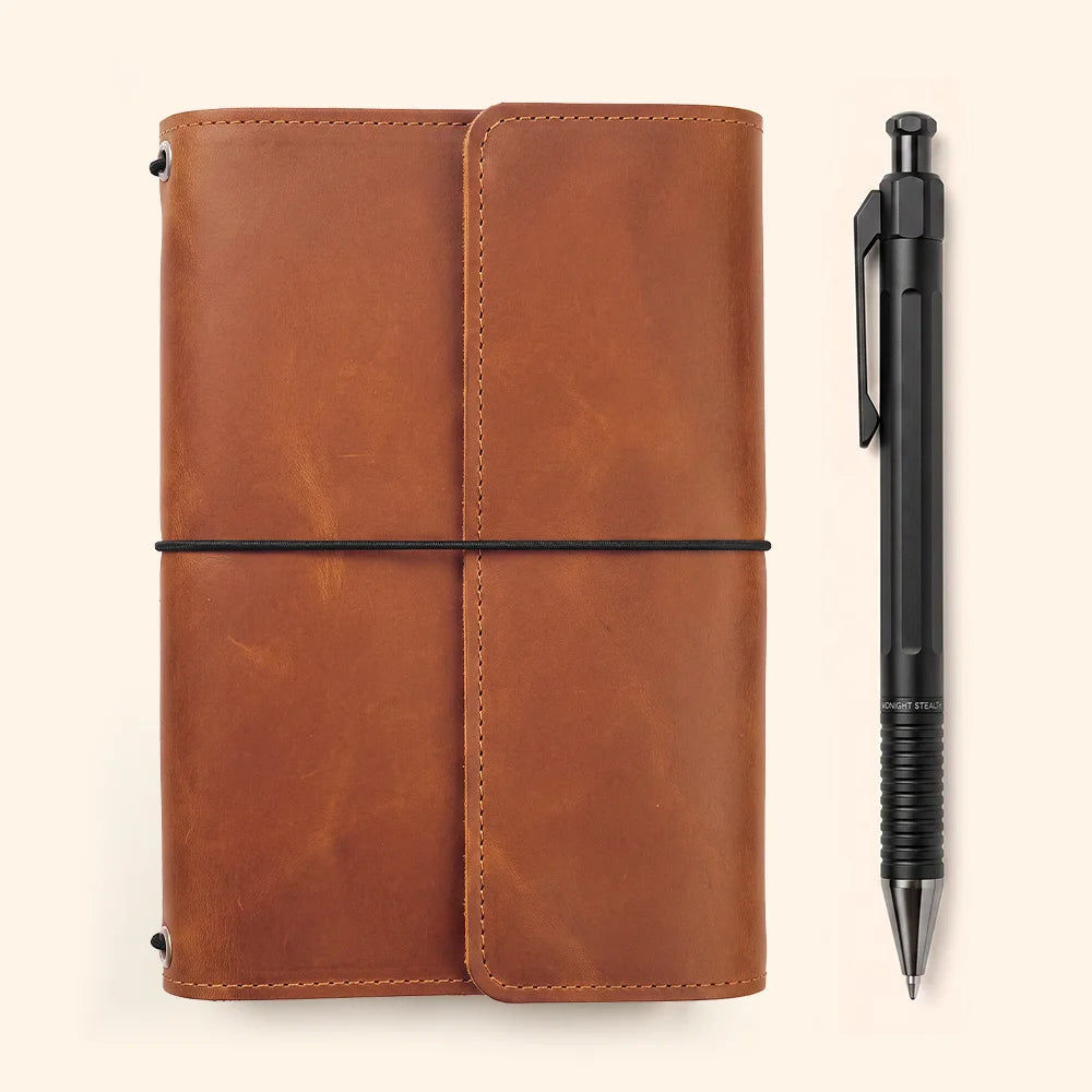Genuine leather journal cover with practical compartments and an integrated leather pen loop