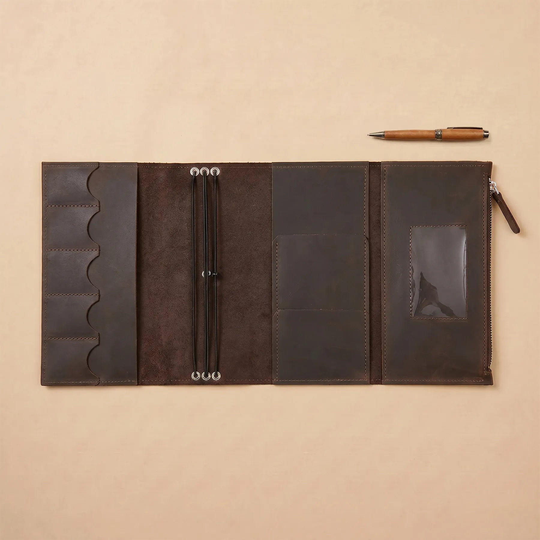 Genuine leather notebook cover with refillable design and elegant rustic appearance.