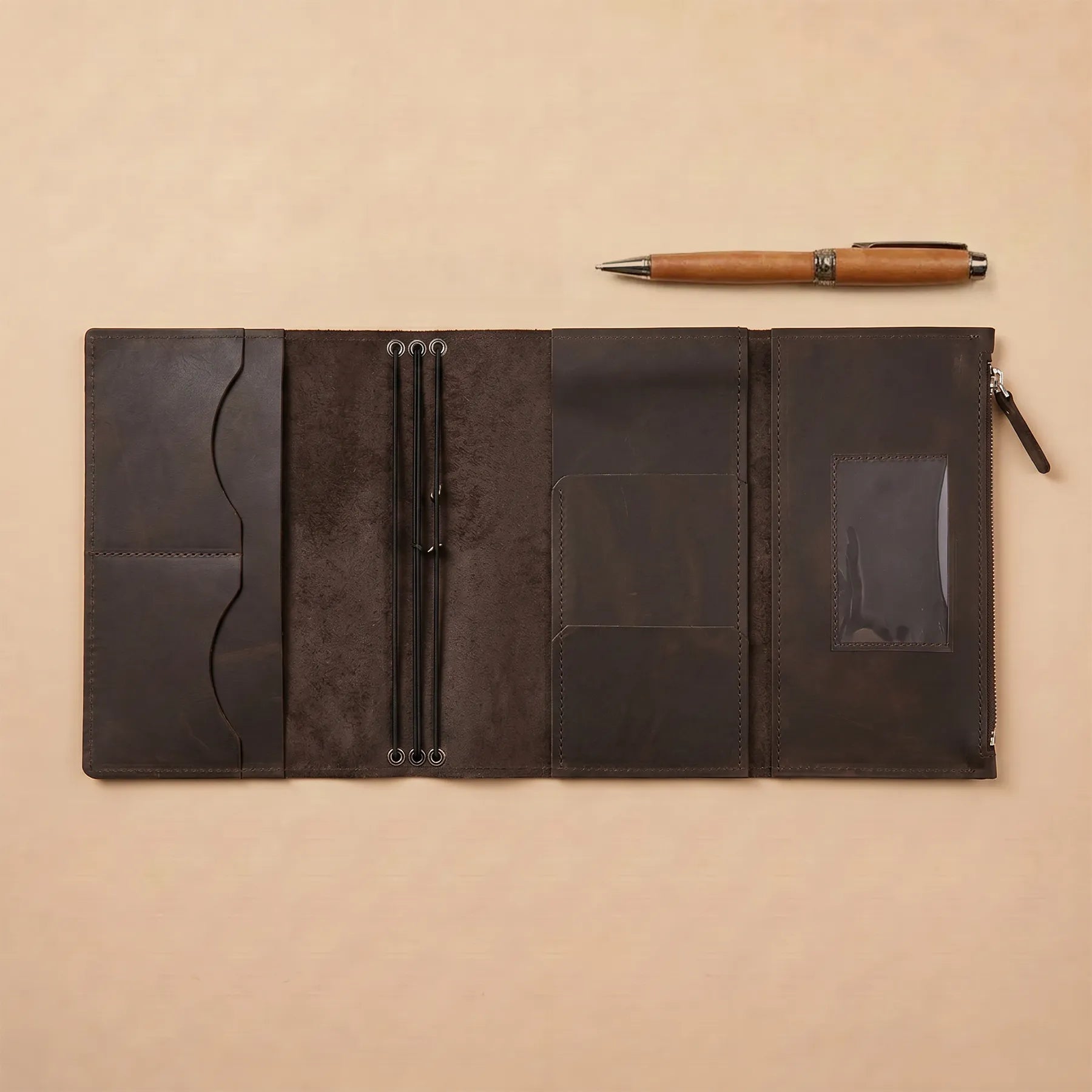 Genuine leather notebook organizer with multiple inserts and handcrafted artisan quality.