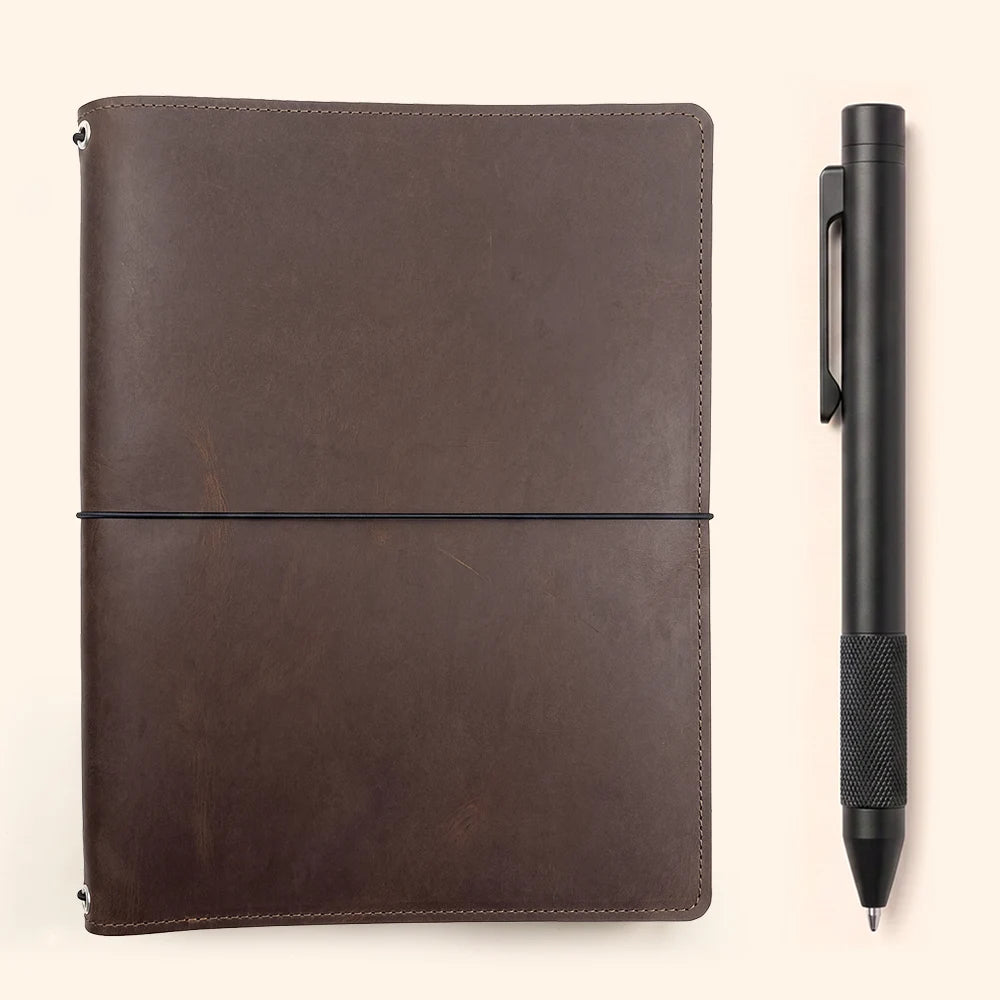 Classic genuine leather cover with three elastic bands for refillable notebook inserts.