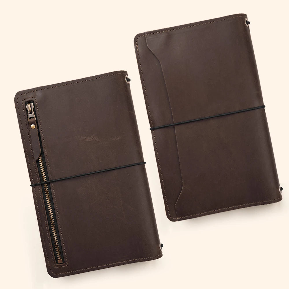 Refillable notebook cover with leather craftsmanship and organized interior document storage.