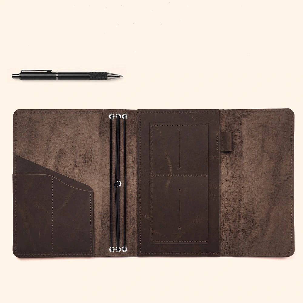 Genuine leather refillable journal case with organizer pockets and practical pen holder.