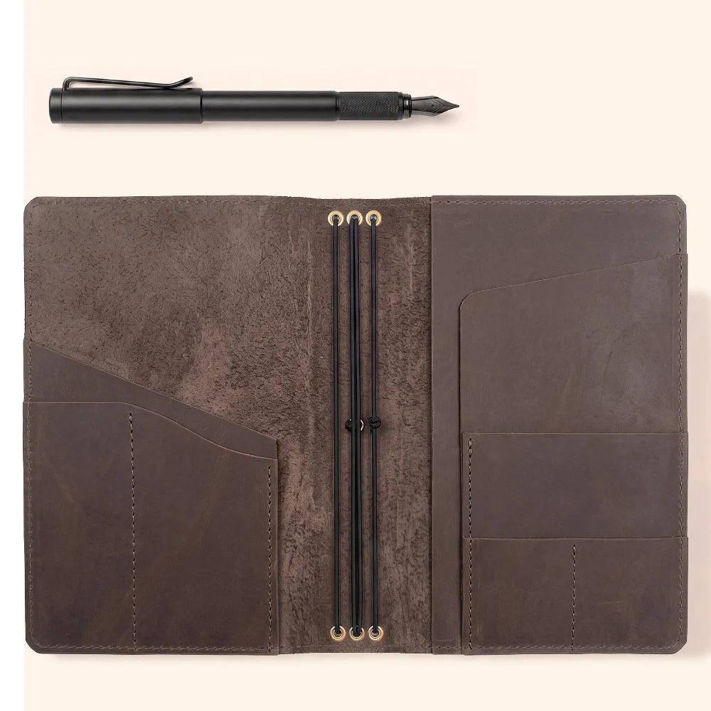 Classic natural leather notebook cover featuring three interior elastic straps.