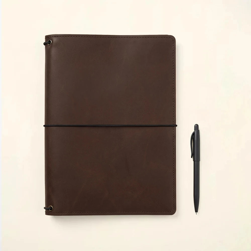 Leather notebook case featuring slim organization and three elastic notebook retainers.