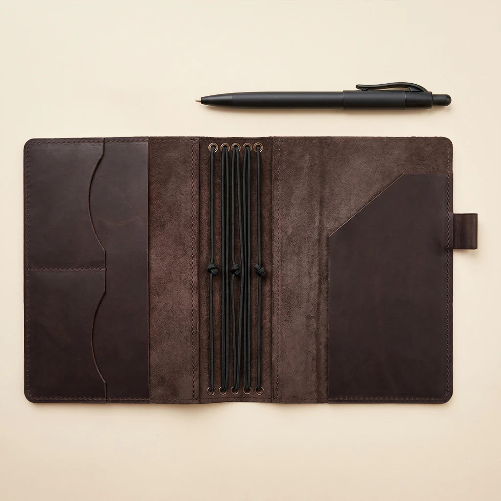 Leather notebook case with pen holder and five elastic notebook holders