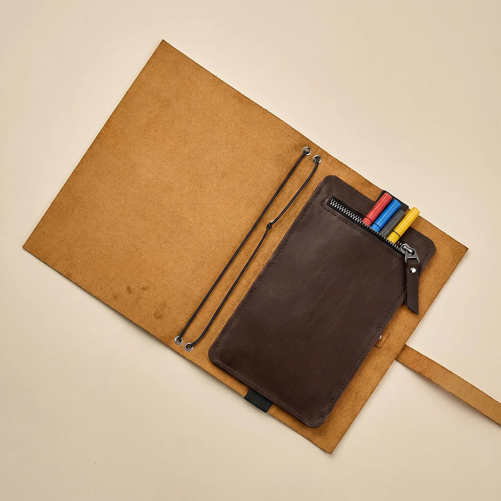 Compact leather pocket for planner, notebook, and journal organization